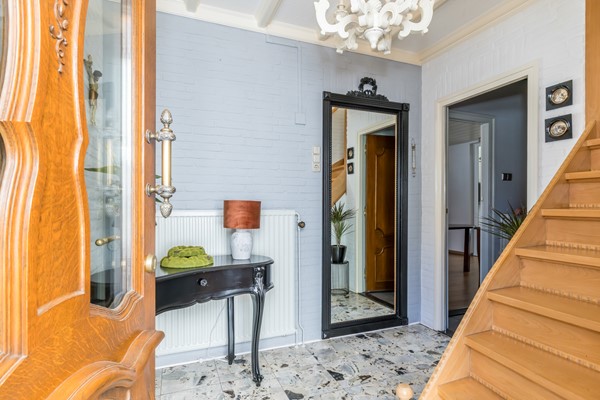 Foto - Verkocht onder voorbehoud: Nette twee- onder- een – kapwoning met serre, zonnige tuin en garage in Bocholtz